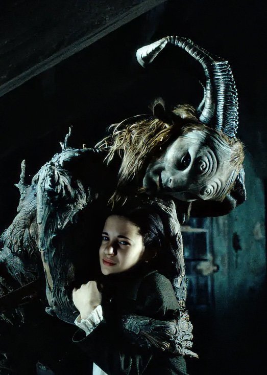 Ofelia reaches toward the Faun